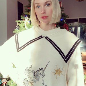Embroidered unicorn sweater worn by January Jones